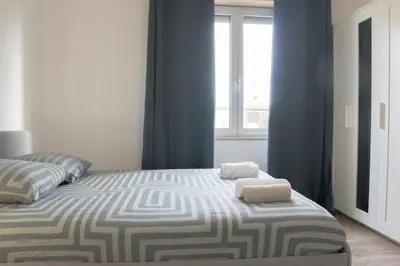 Un ou plusieurs lits dans un hébergement de l'établissement Smart Appart, spacious and functional