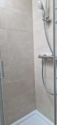Salle de bains dans l'établissement Deux appartements proche Disneyland