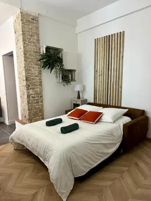 Un ou plusieurs lits dans un hébergement de l'établissement Appartement cozy & Spa