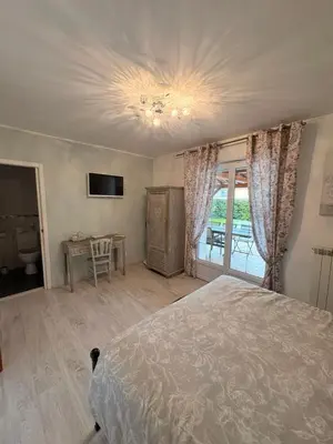 Un ou plusieurs lits dans un hébergement de l'établissement Chambre d'Hôte Les Ondines