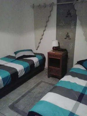Un ou plusieurs lits dans un hébergement de l'établissement Villa Jules Verne - Chambres d'hôtes et gîte