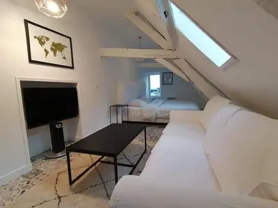 Un ou plusieurs lits dans un hébergement de l'établissement Chambres Boufflet