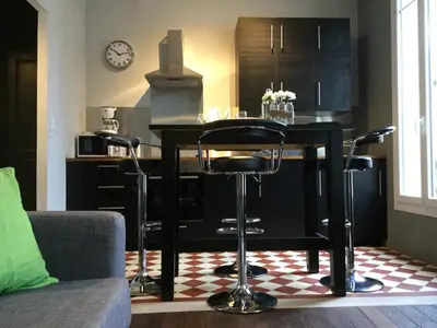 Télévision ou salle de divertissement dans l'établissement Résidence Champs Bouillant