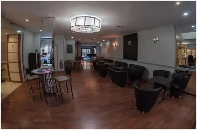 Coin salon dans l'établissement Hôtel Gambetta