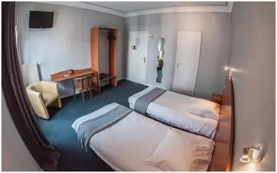 Un ou plusieurs lits dans un hébergement de l'établissement Hôtel Gambetta