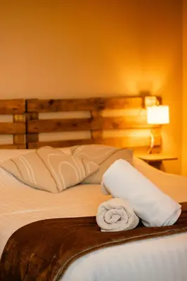 Un ou plusieurs lits dans un hébergement de l'établissement Rêve Champenois Chambres d'Hôtes