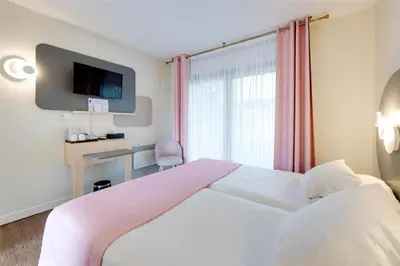 Un ou plusieurs lits dans un hébergement de l'établissement Sure Hotel by Best Western Saint-Quentin Ouest Le pot d étain