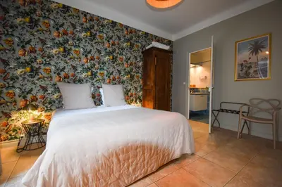 Un ou plusieurs lits dans un hébergement de l'établissement Hôtel Azur Reims Centre