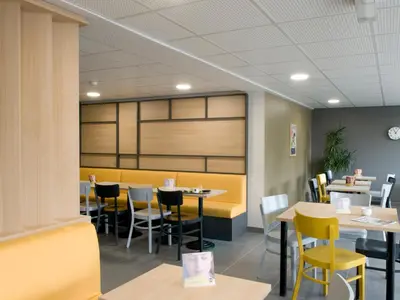 Restaurant ou autre lieu de restauration dans l'établissement B&B HOTEL Saint-Quentin