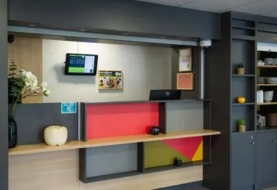 Télévision ou salle de divertissement dans l'établissement B&B HOTEL Saint-Quentin
