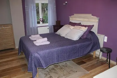 Un ou plusieurs lits dans un hébergement de l'établissement Au Relais Du Canal à Grand Gabarit