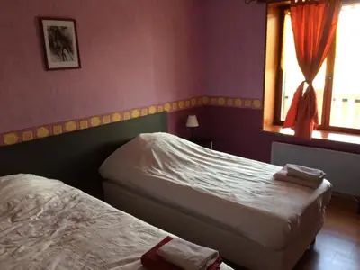 Un ou plusieurs lits dans un hébergement de l'établissement El Rancho Criollo Rooms and Gites