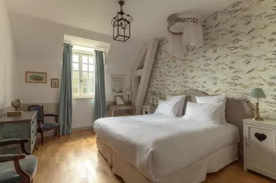 Un ou plusieurs lits dans un hébergement de l'établissement Le Château d'Etoges - Champagne