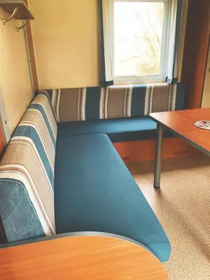 Coin salon dans l'établissement L'auberge du moulin des prés