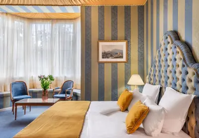 Un ou plusieurs lits dans un hébergement de l'établissement Grand Hôtel Des Templiers