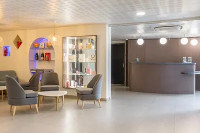 Coin salon dans l'établissement Sure Hotel by Best Western Reims Nord