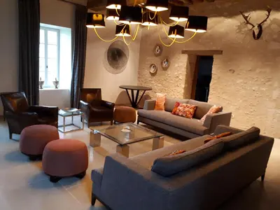 Coin salon dans l'établissement Ferme du Château