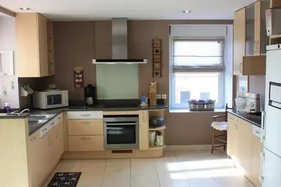 Cuisine ou kitchenette dans l'établissement Gîte le St Vincent