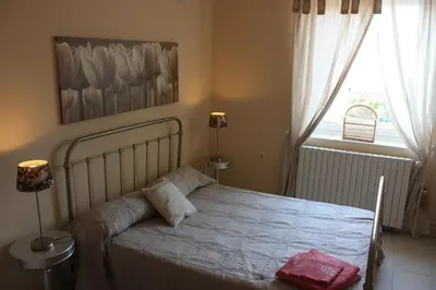 Un ou plusieurs lits dans un hébergement de l'établissement Gîte le St Vincent