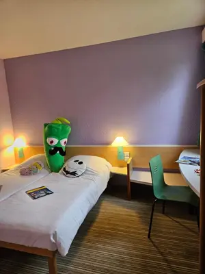 Un ou plusieurs lits dans un hébergement de l'établissement Hotel Bonanite