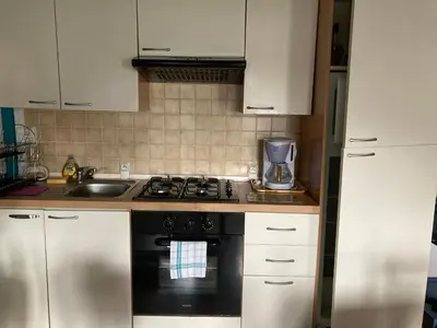 Cuisine ou kitchenette dans l'établissement Le Clergite