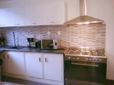 Cuisine ou kitchenette dans l'établissement La Pierre Précieuse
