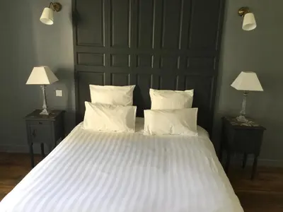 Un ou plusieurs lits dans un hébergement de l'établissement Le Clos d 'Aÿ