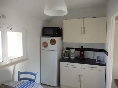 Cuisine ou kitchenette dans l'établissement Appartement Liartais - Accueil Chevaux - Horse Friendly