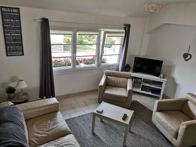 Télévision ou salle de divertissement dans l'établissement Appartement Liartais - Accueil Chevaux - Horse Friendly