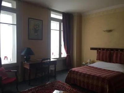 Un ou plusieurs lits dans un hébergement de l'établissement Hôtel De Paris