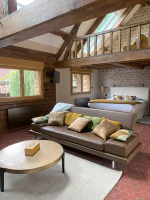 Coin salon dans l'établissement Auberge De L'abbaye