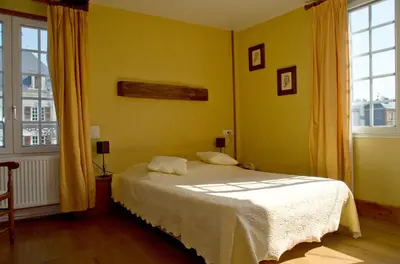Un ou plusieurs lits dans un hébergement de l'établissement Auberge De L'abbaye