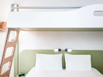 Un ou plusieurs lits dans un hébergement de l'établissement ibis budget Noyon