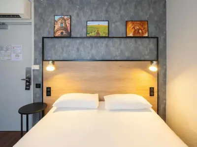 Un ou plusieurs lits dans un hébergement de l'établissement ibis Epernay Centre Ville