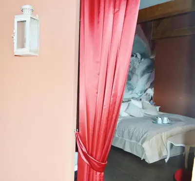 Un ou plusieurs lits dans un hébergement de l'établissement Le Clos Margot