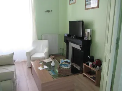 Télévision ou salle de divertissement dans l'établissement Chambre D'hôtes Les Epicuriens