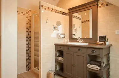 Salle de bains dans l'établissement Le Logis Aux Bulles