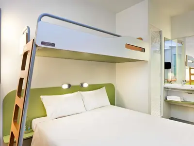 Un ou plusieurs lits dans un hébergement de l'établissement ibis budget Roye
