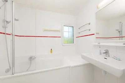 Salle de bains dans l'établissement Center Parcs Le Lac d’Ailette