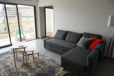 Coin salon dans l'établissement Appartement Forum Reims