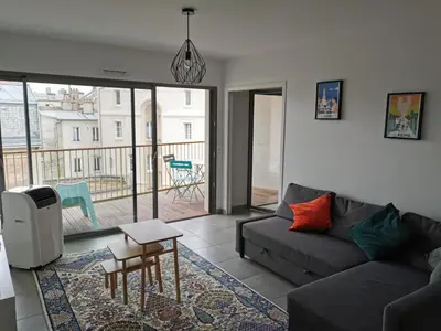 Coin salon dans l'établissement Appartement Forum Reims