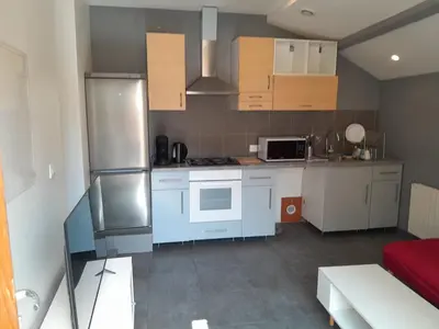 Cuisine ou kitchenette dans l'établissement Maison Duplex & Appartement sur cour