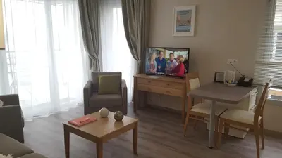 Télévision ou salle de divertissement dans l'établissement Résidence Séniors Domitys Les Hautes Feuilles