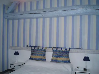 Un ou plusieurs lits dans un hébergement de l'établissement Maison d'Hôtes Ferme d'Issonges B&B