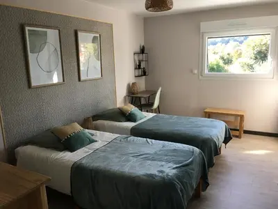 Un ou plusieurs lits dans un hébergement de l'établissement Le gîte du familistère