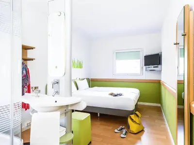 Un ou plusieurs lits dans un hébergement de l'établissement ibis budget Saint-Quentin Centre Gare