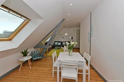 Coin salon dans l'établissement Chambres d'hotes Les Nuits Pastel