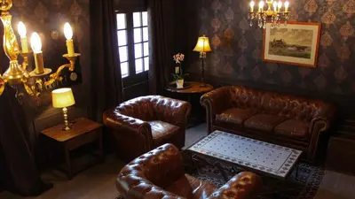 Coin salon dans l'établissement Le Lodge des Bruyères