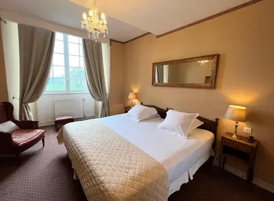 Un ou plusieurs lits dans un hébergement de l'établissement Château d'Ermenonville