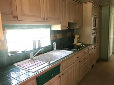 Cuisine ou kitchenette dans l'établissement L'Appentis